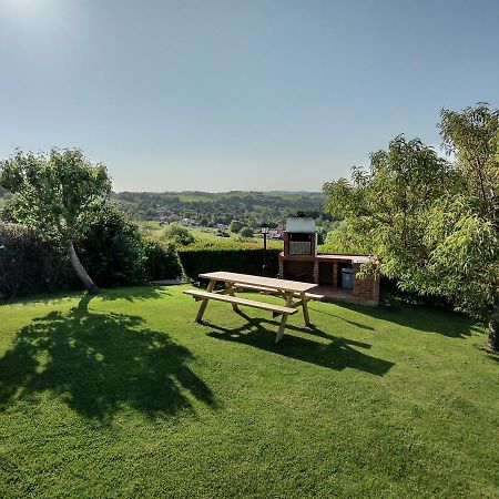Apartamentos Corona Comillas Bagian luar foto